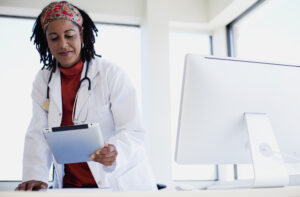 Doctor with Tablet