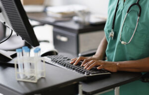 nurse on computer